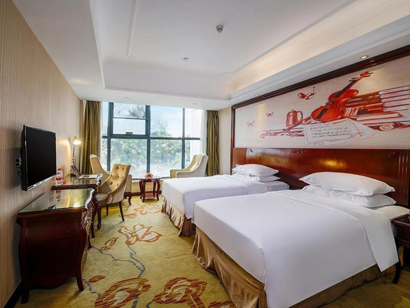 Vienna Hotel Shenzhen Shuiku New Village Esterno foto
