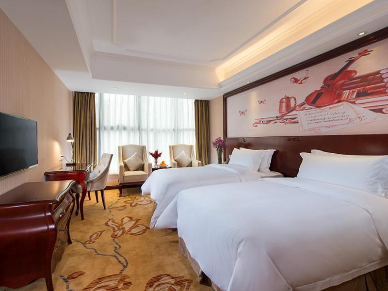 Vienna Hotel Shenzhen Shuiku New Village Esterno foto